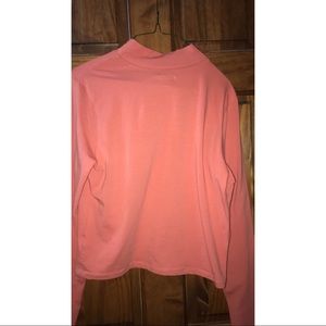 Coral turtleneck